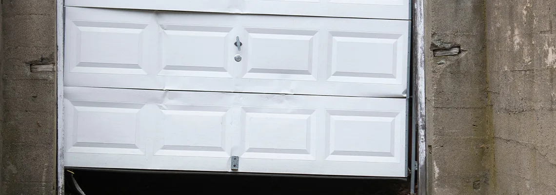 Garage Door Got Hit By A Car Dent Removal in Brampton, ON