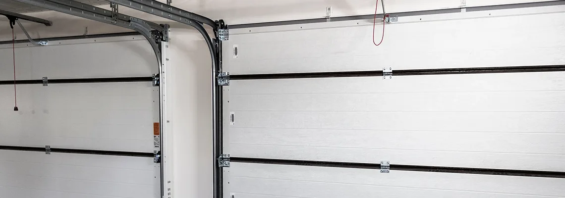 Fix Folding Garage Door Jerking in Brampton, Ontario