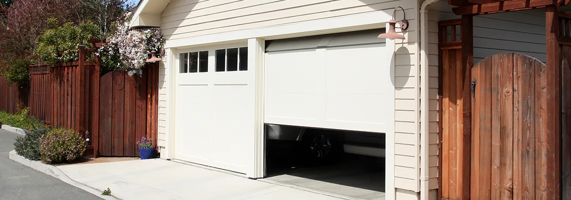 Fix Metal Garage Door Jerking in Brampton, Ontario